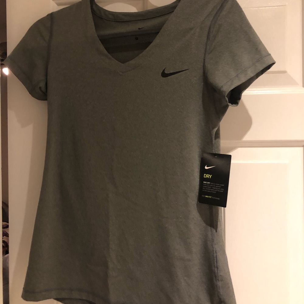 NWT. Nike Dri-fit gray short sleeve shirt.